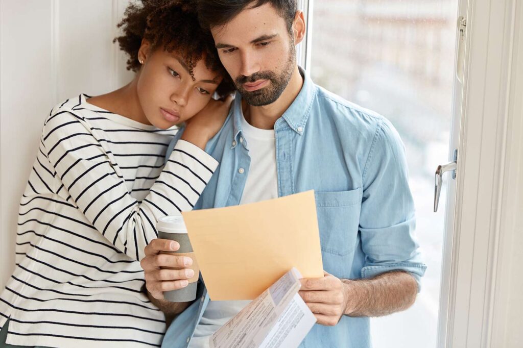 Couple Reading Eviction Notice