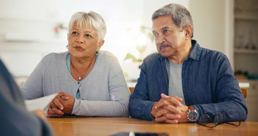 Senior Couple Looking at Documents